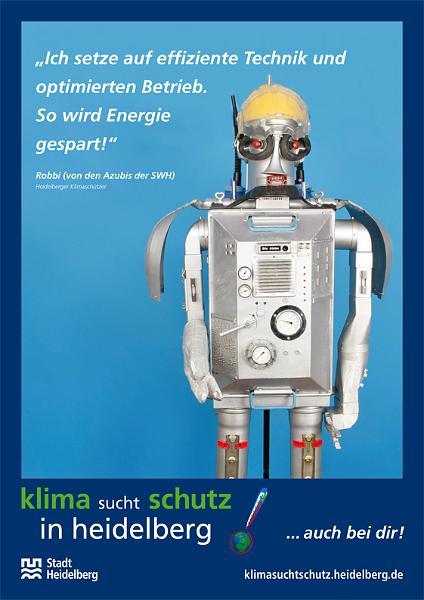 64_klimasuchtschutz_robbi.jpg - Robbi (von den Azubis der SWH): „Ich setze auf effiziente Technik und optimierten Betrieb. So wird Energie gespart!“